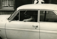 Lotje Kesteleyn in een wagen, Melle, 1960-1970