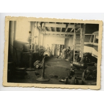 Aan het werk in de garage, Bottelare, 1945-1955